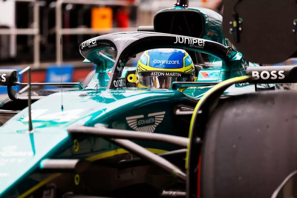 Fernando Alonso, Aston Martin AMR24, in the pit lane 