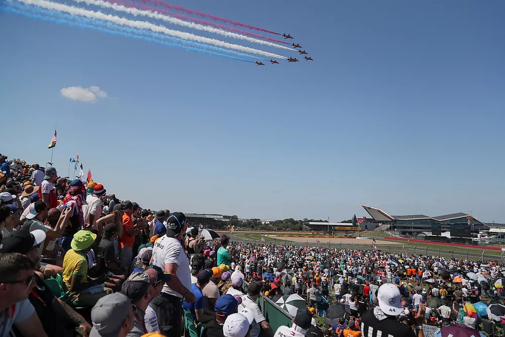 The RAF aerobatic display team, the Red Arrows, perform for the crowds in their BAE Systems Hawk T.Mk.1A's