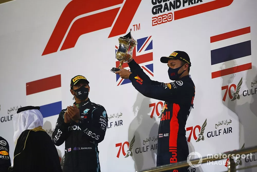Alex Albon, Red Bull Racing, 3rd position, receives his trophy