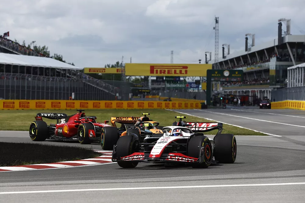 Nico Hulkenberg, Haas VF-23, Lando Norris, McLaren MCL60, Charles Leclerc, Ferrari SF-23