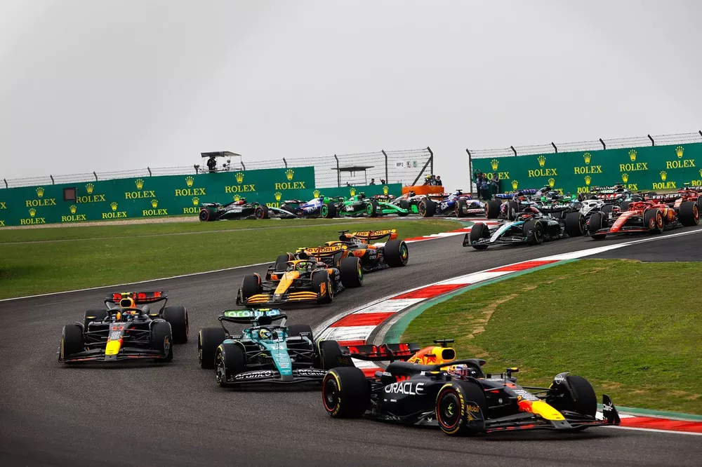 Max Verstappen, Red Bull Racing RB20 leads Fernando Alonso, Aston Martin AMR24 and Sergio Perez, Red Bull Racing RB20