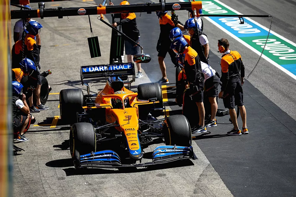 Daniel Ricciardo, McLaren MCL35M, makes a pit stop