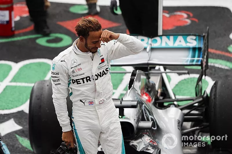 Lewis Hamilton, Mercedes AMG F1, celebrates after securing his 5th world drivers title