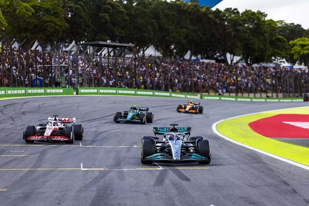 George Russell, Mercedes W13, Kevin Magnussen, Haas VF-22, Sebastian Vettel, Aston Martin AMR22, Lando Norris, McLaren MCL36, to the Sprint grid