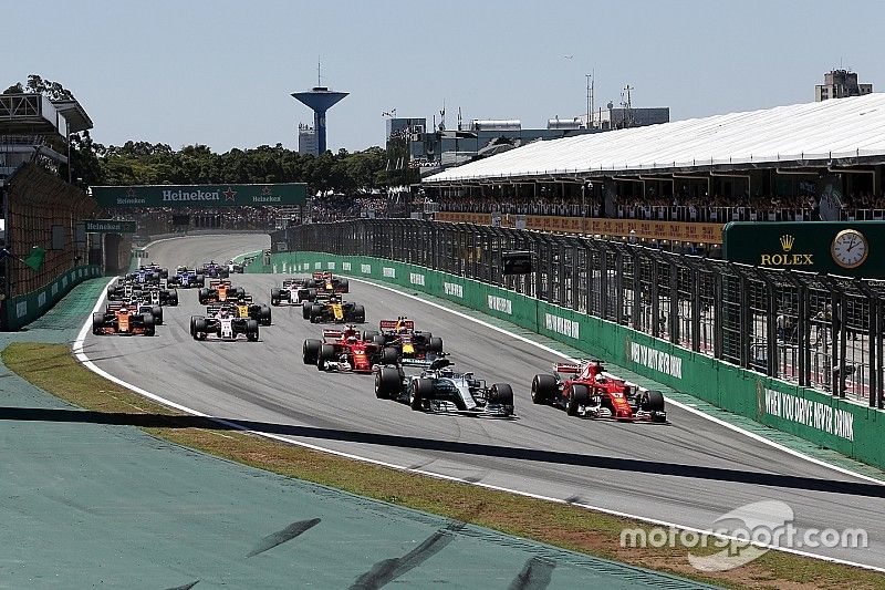 Valtteri Bottas, Mercedes-Benz F1 W08  and Sebastian Vettel, Ferrari SF70H battle at the start of th