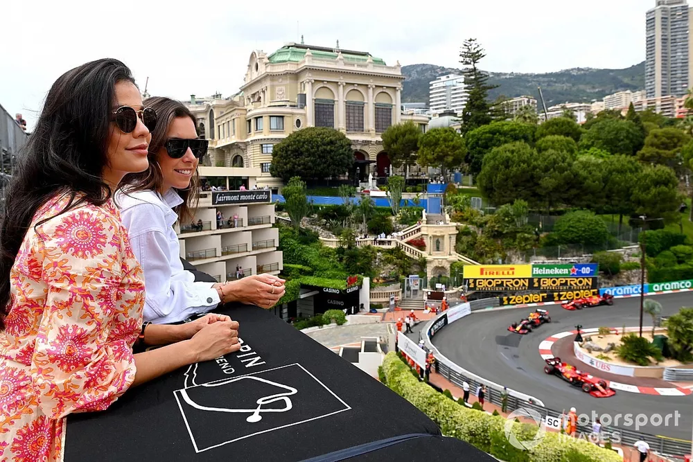 Fans watch as Charles Leclerc, Ferrari SF21, Sergio Pérez, Red Bull Racing RB16B, Carlos Sainz Jr., Ferrari SF21