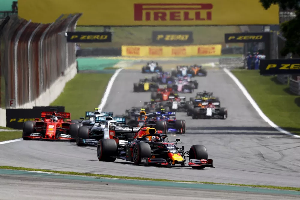 Max Verstappen, Red Bull Racing RB15 leads Lewis Hamilton, Mercedes AMG F1 W10 and Sebastian Vettel, Ferrari SF90 at the start of the race