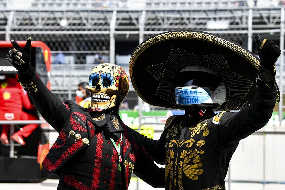 Mascots Fermin La Calaca and Mario Achi in the pit lane