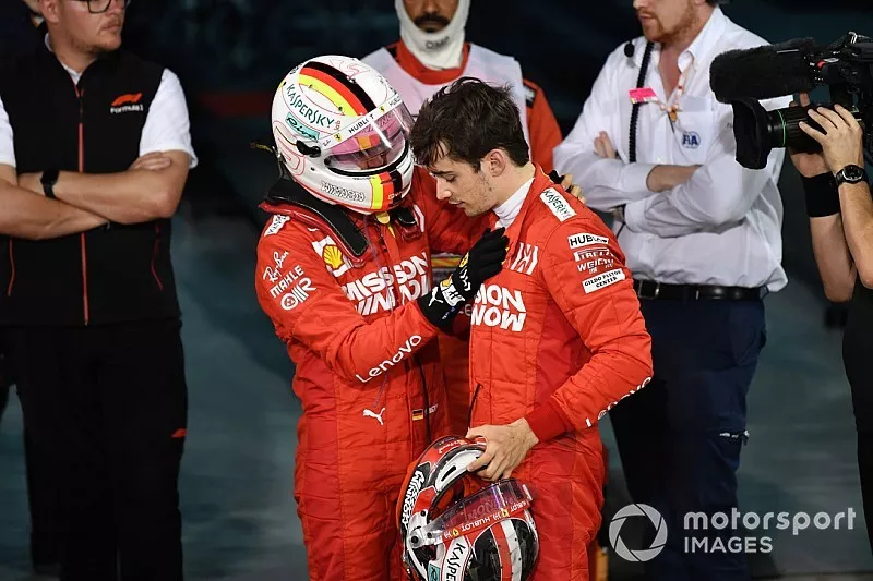 Sebastian Vettel, Ferrari, congratulates Charles Leclerc, Ferrari, 3rd position, on a good performance, in Parc Ferme