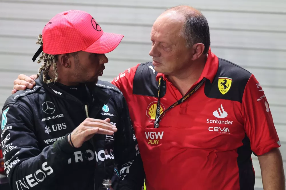 Sir Lewis Hamilton, Mercedes-AMG, 3rd position, and Frederic Vasseur, Team Principal and General Manager, Scuderia Ferrari, talk after the race