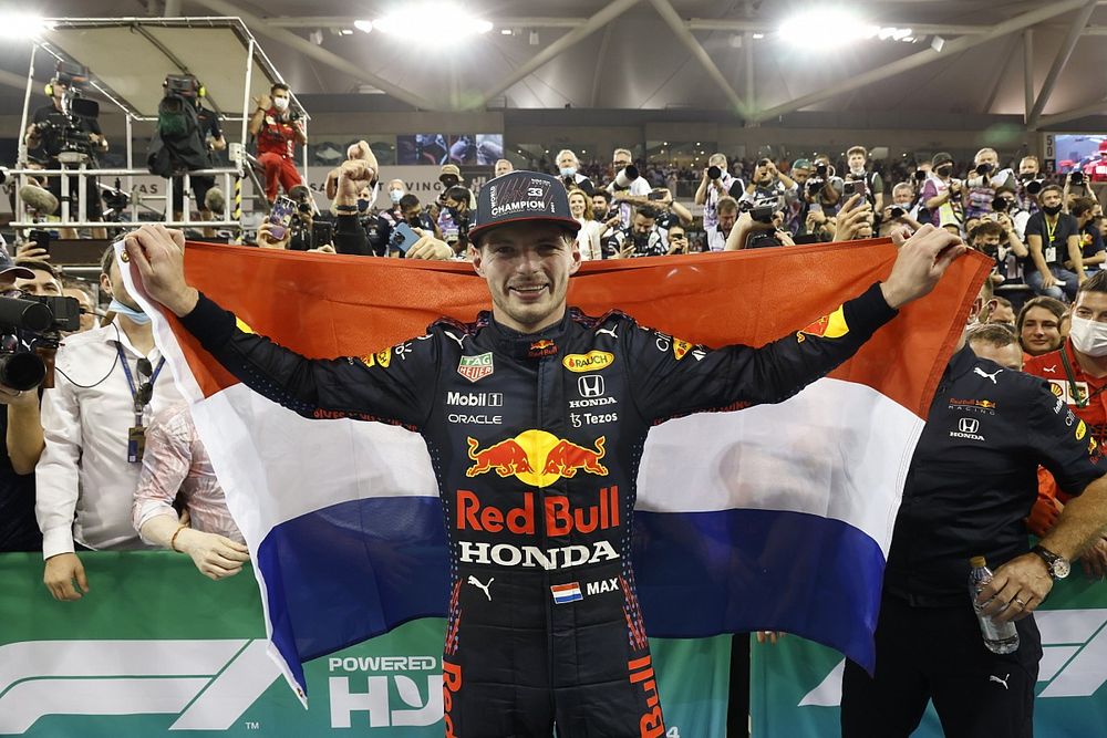 Max Verstappen, Red Bull Racing, 1st position, celebrates with a Dutch flag in Parc Ferme