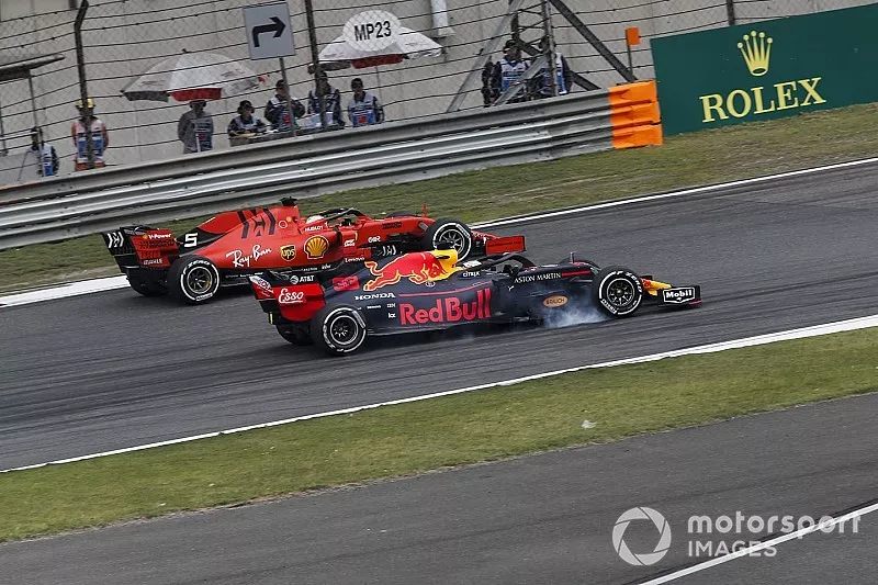 Sebastian Vettel, Ferrari SF90 and Max Verstappen, Red Bull Racing RB15 battle 