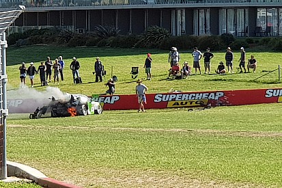 Spectator pictured fighting Bathurst 12 Hour crash fire