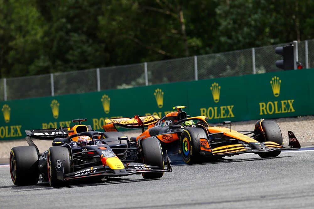 Max Verstappen, Red Bull Racing RB20, leads Lando Norris, McLaren MCL38