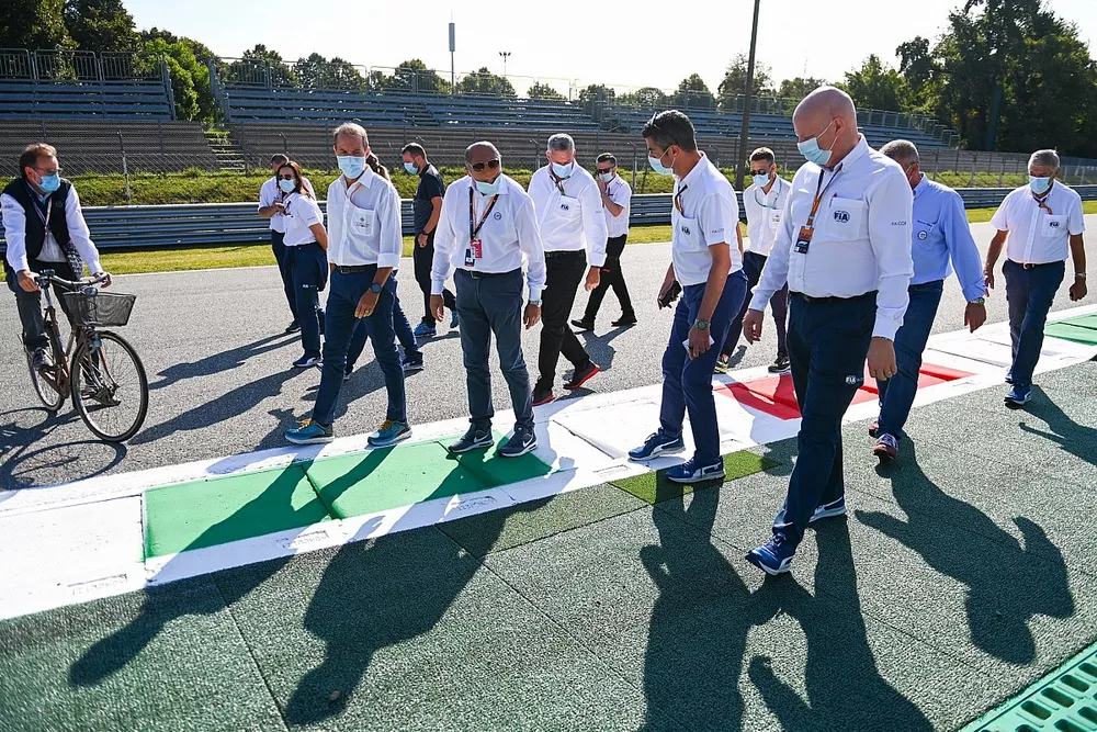 Michael Masi, Race Director, inspects a kerb with FIA colleagues, Monza and Automobile Club d'Italia representatives