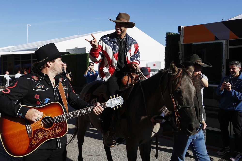 Daniel Ricciardo, McLaren, on a horse