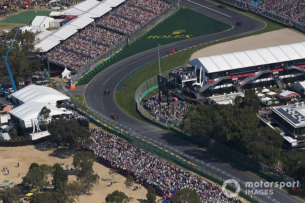 Sebastian Vettel, Ferrari SF90, leads Max Verstappen, Red Bull Racing RB15