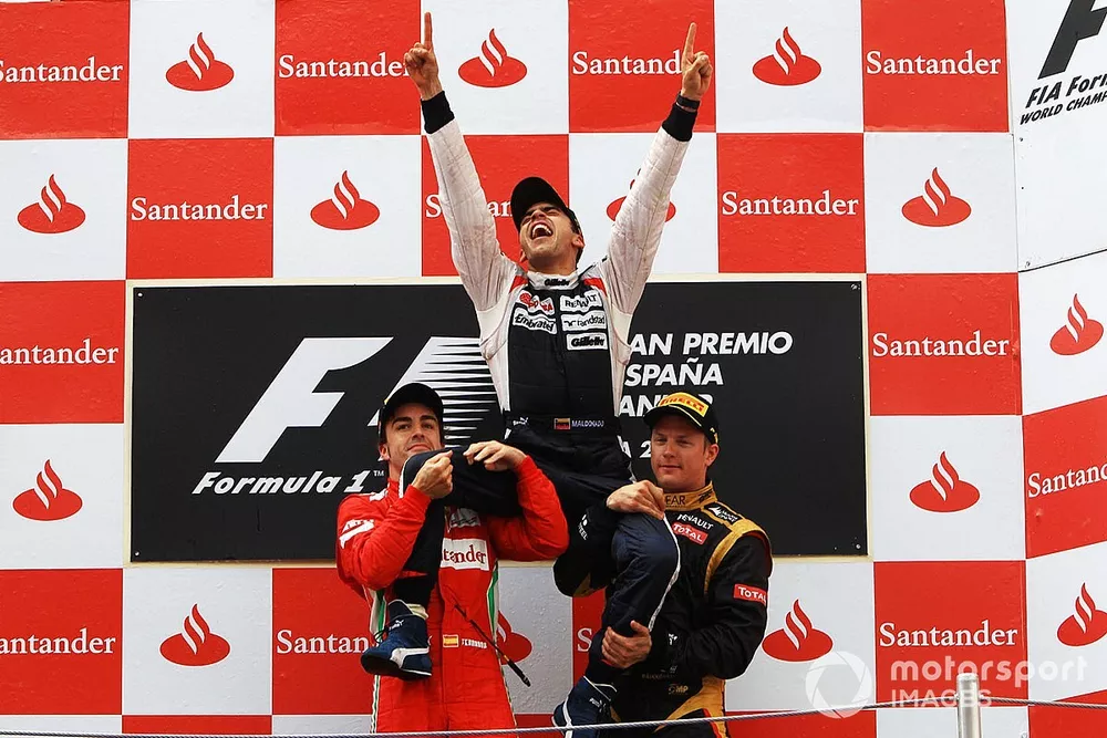 Podium : le vainqueur Pastor Maldonado, Williams, le second Fernando Alonso, Ferrari, le troisi&egrave;me Kimi R&auml;ikk&ouml;nen, Lotus