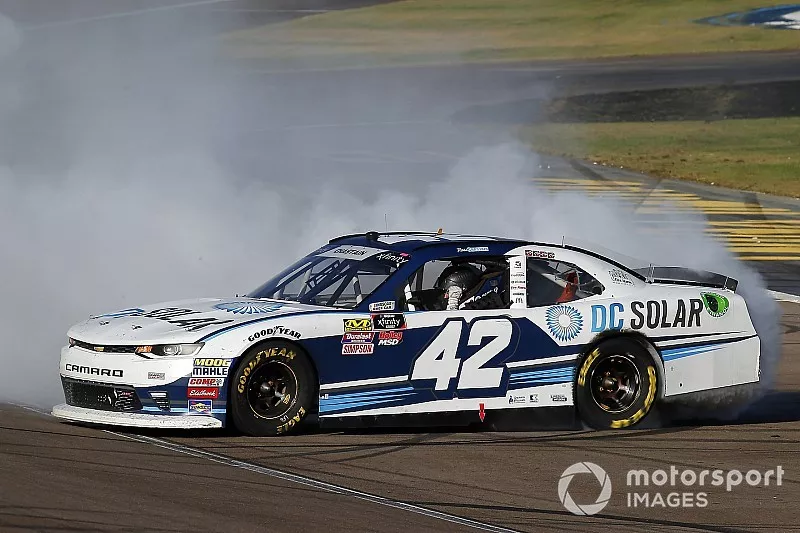Ross Chastain, Chip Ganassi Racing, Chevrolet Camaro DC Solar celebrates his win with a burnout