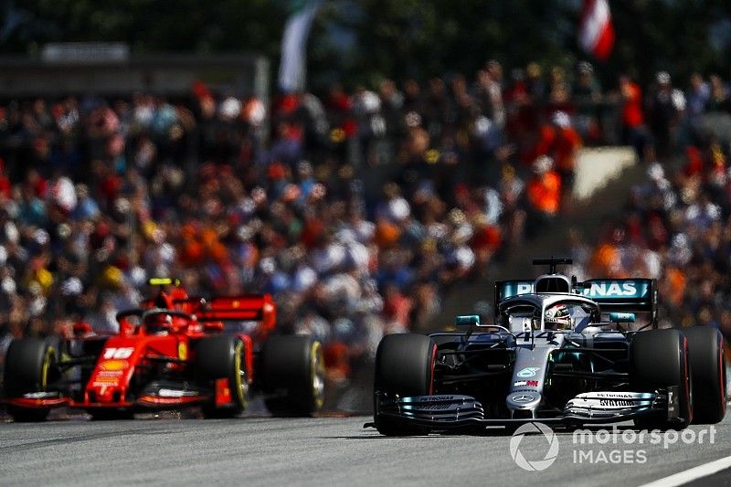 Lewis Hamilton, Mercedes AMG F1 W10 and Charles Leclerc, Ferrari SF90 