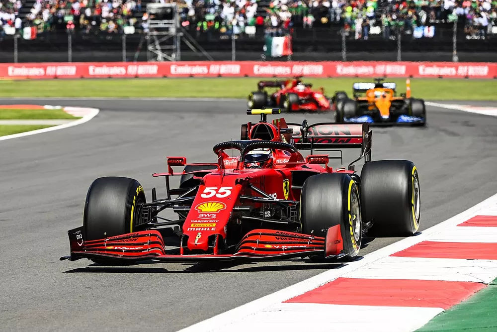 Carlos Sainz Jr., Ferrari SF21, Daniel Ricciardo, McLaren MCL35M, and Charles Leclerc, Ferrari SF21