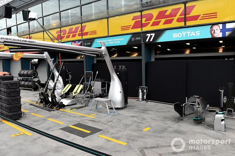 Equipment is packed away outside the Mercedes garage