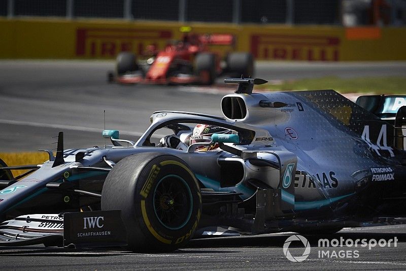 Lewis Hamilton, Mercedes AMG F1 W10, leads Charles Leclerc, Ferrari SF90
