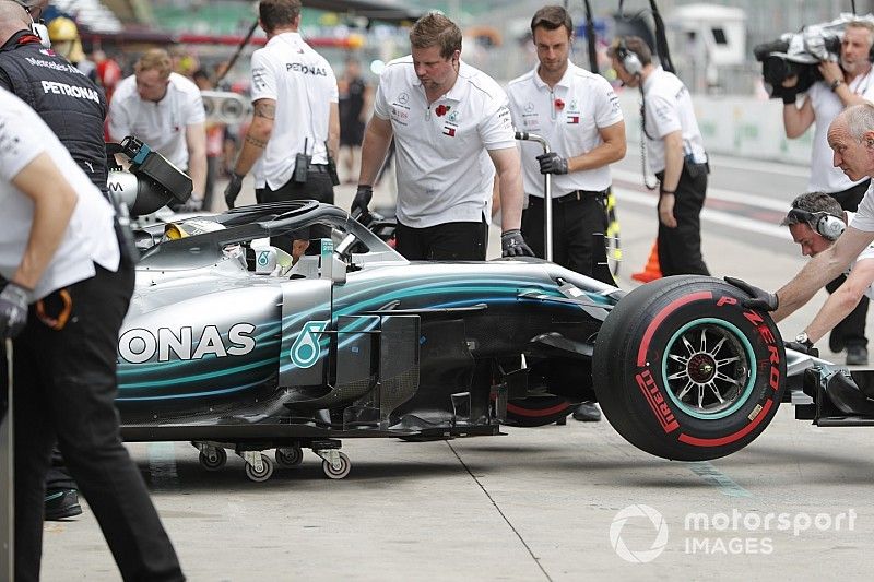 Lewis Hamilton, Mercedes AMG F1 W09 EQ Power+, is returned to the garage