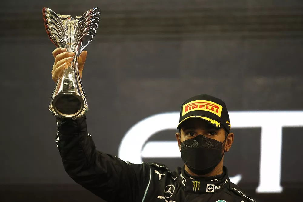 Lewis Hamilton, Mercedes, 2nd position, lifts his trophy on the podium