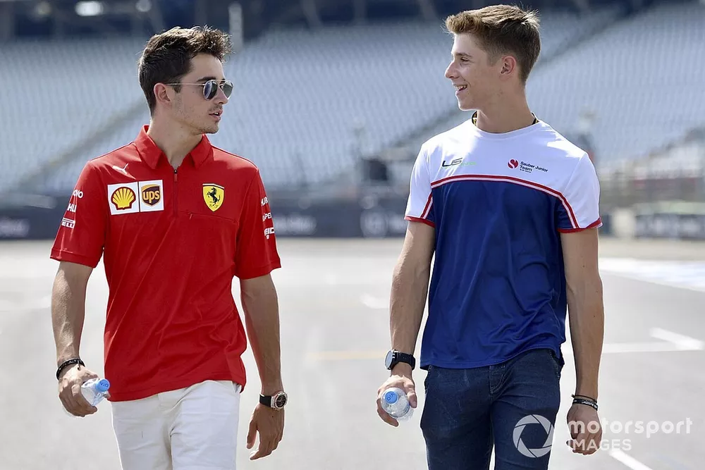 Charles Leclerc, Ferrari walks the track with his brother Arthur Leclerc