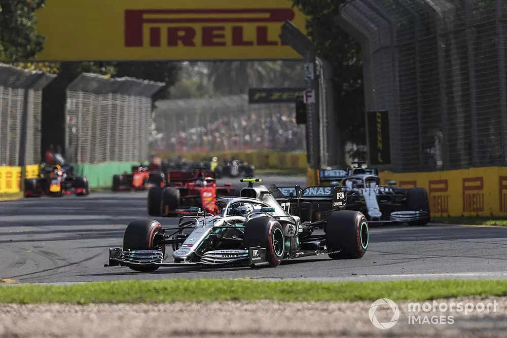 Valtteri Bottas, Mercedes AMG W10, leads Lewis Hamilton, Mercedes AMG F1 W10, and Sebastian Vettel, Ferrari SF90