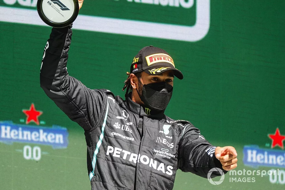 Lewis Hamilton, Mercedes, 1st position, with his trophy