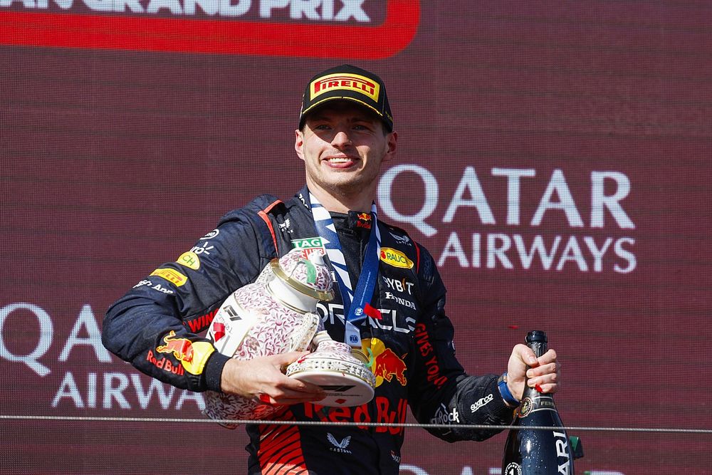 Max Verstappen, Red Bull Racing, 1st position, holds his broken trophy