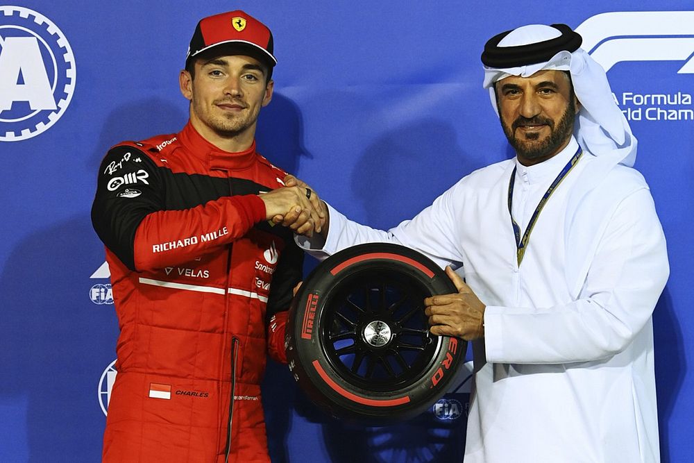 Charles Leclerc, Ferrari, is presented with the Pole Position award by Mohammed bin Sulayem, President, FIA
