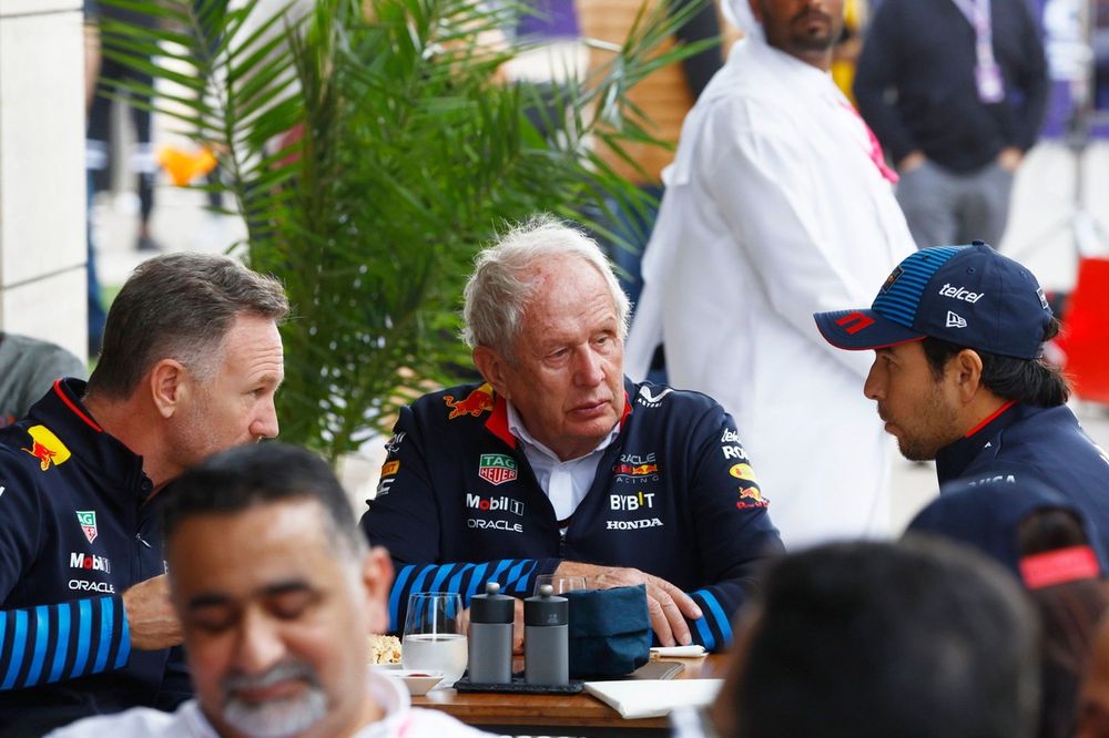 Christian Horner, Team Principal, Red Bull Racing, talks with Helmut Marko, Consultant, Red Bull Racing, Sergio Perez, Red Bull Racing