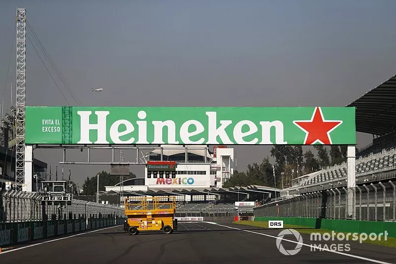 Heineken branding on a pit straight bridge