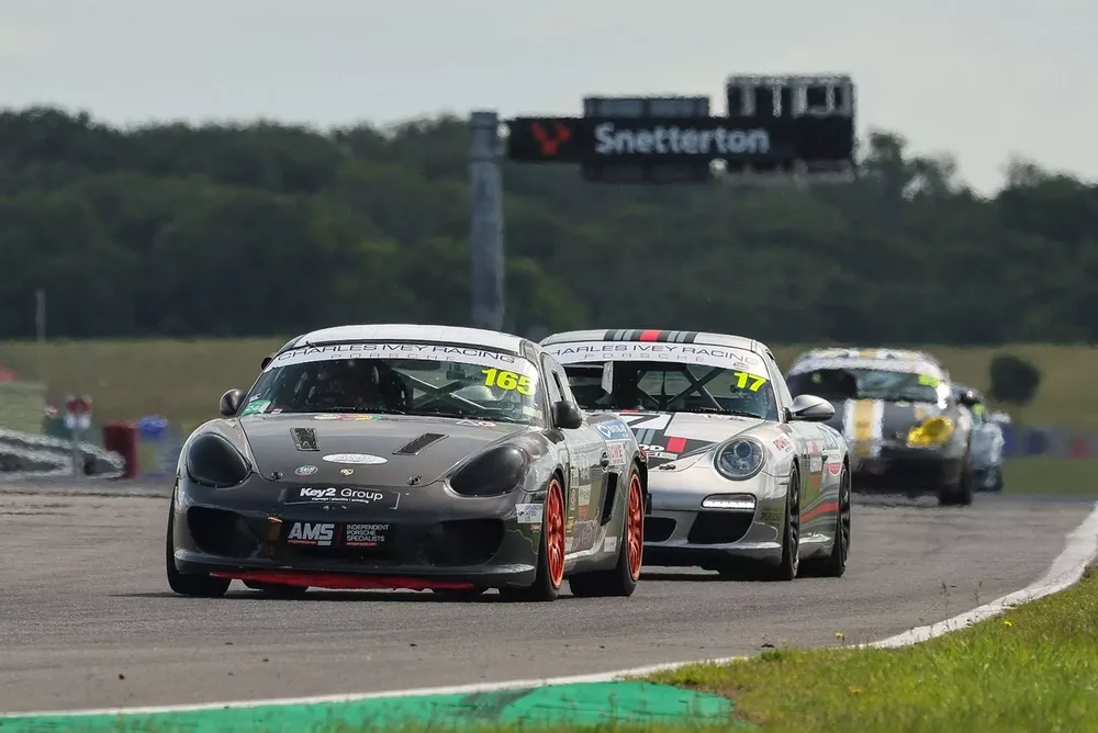 Warren Allen (165) won the second CALM Porshe trophy race ahead of Richard Neall (17)