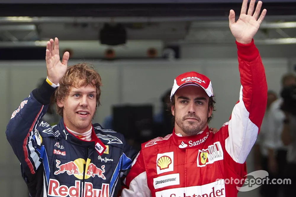 Sebastian Vettel, Red Bull Racing celebrates his pole position and Fernando Alonso, Ferrari