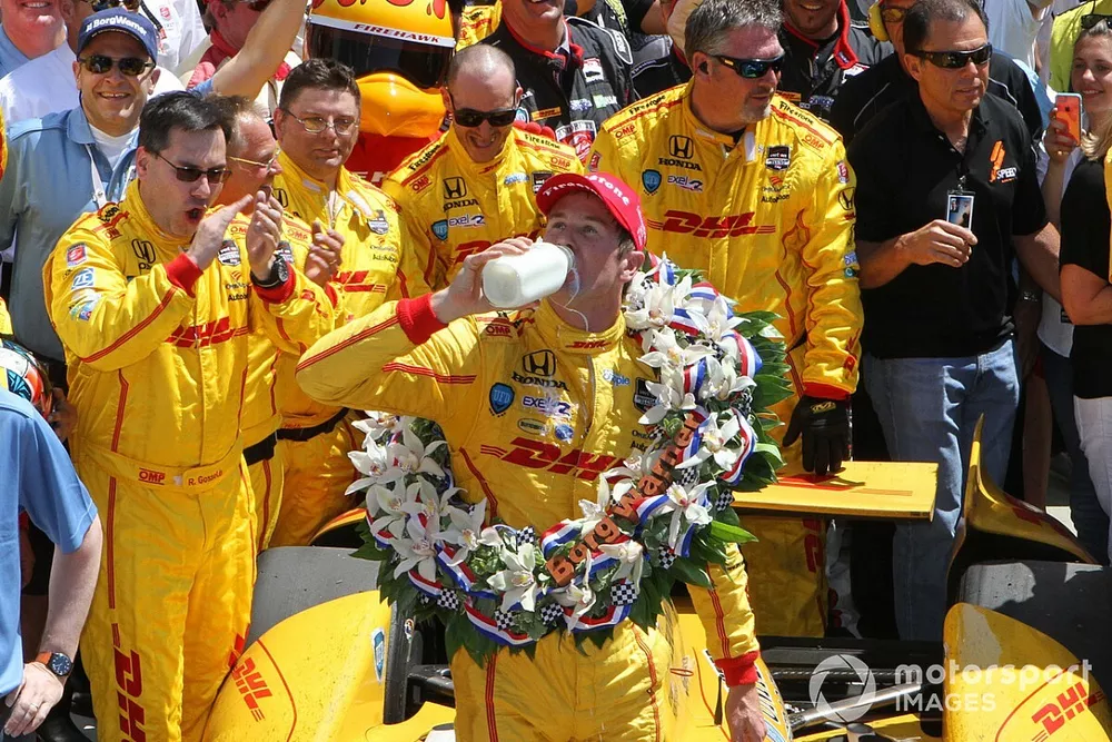 Ryan Hunter-Reay of Andretti Auto Sport celebrates with the traditional bottle of milk in Victory Circle after winning the 98th running of the Indianapolis 500 Mile Race