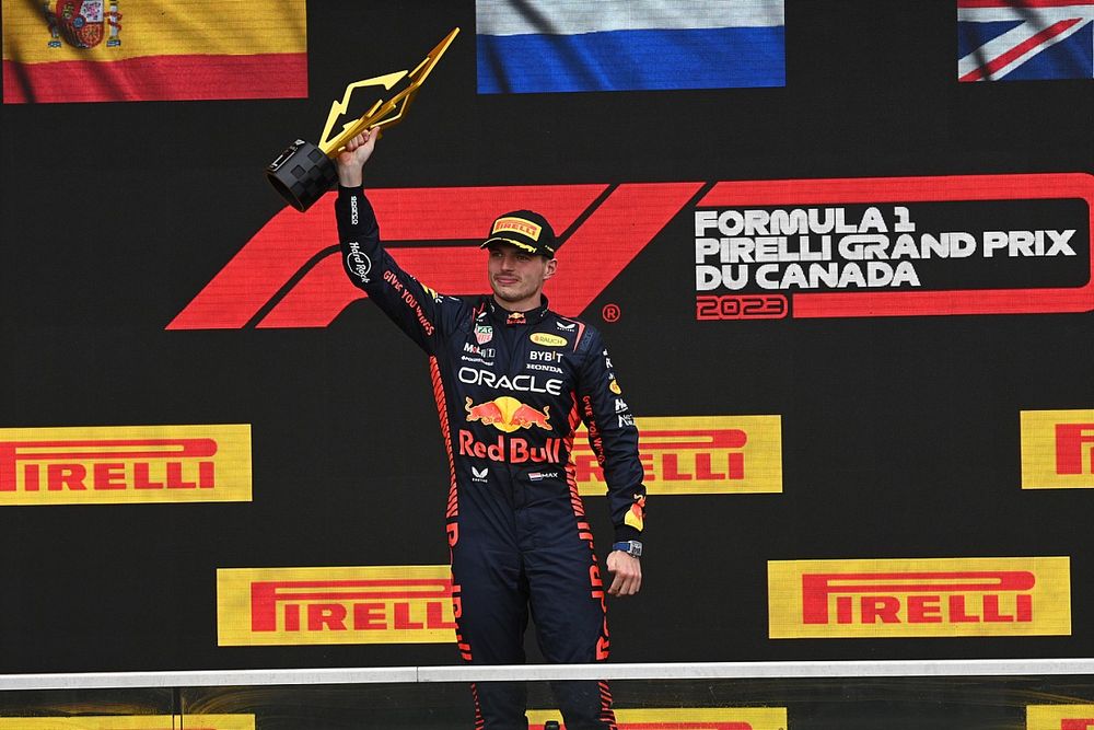 Max Verstappen, Red Bull Racing, 1st position, lifts the winners trophy