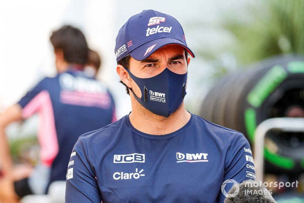 Sergio Perez, Racing Point, talks to the press 