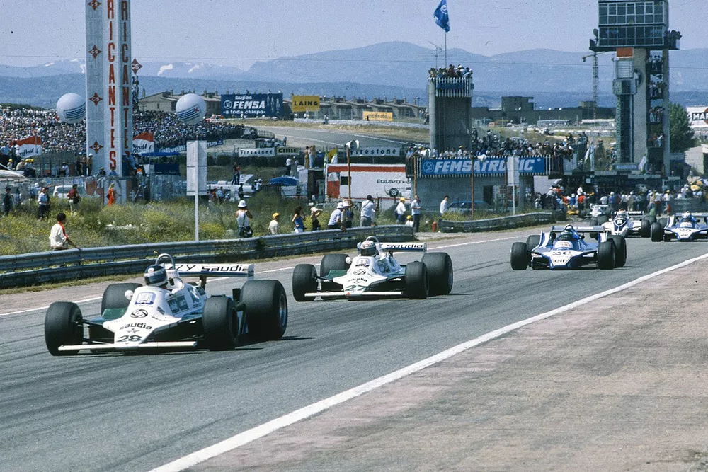 Carlos Reutemann, Williams FW07B Ford, leads Alan Jones, Williams FW07B Ford, Jacques Laffite, Ligier JS11/15 Ford, and Didier Pironi, Ligier JS11/15 Ford