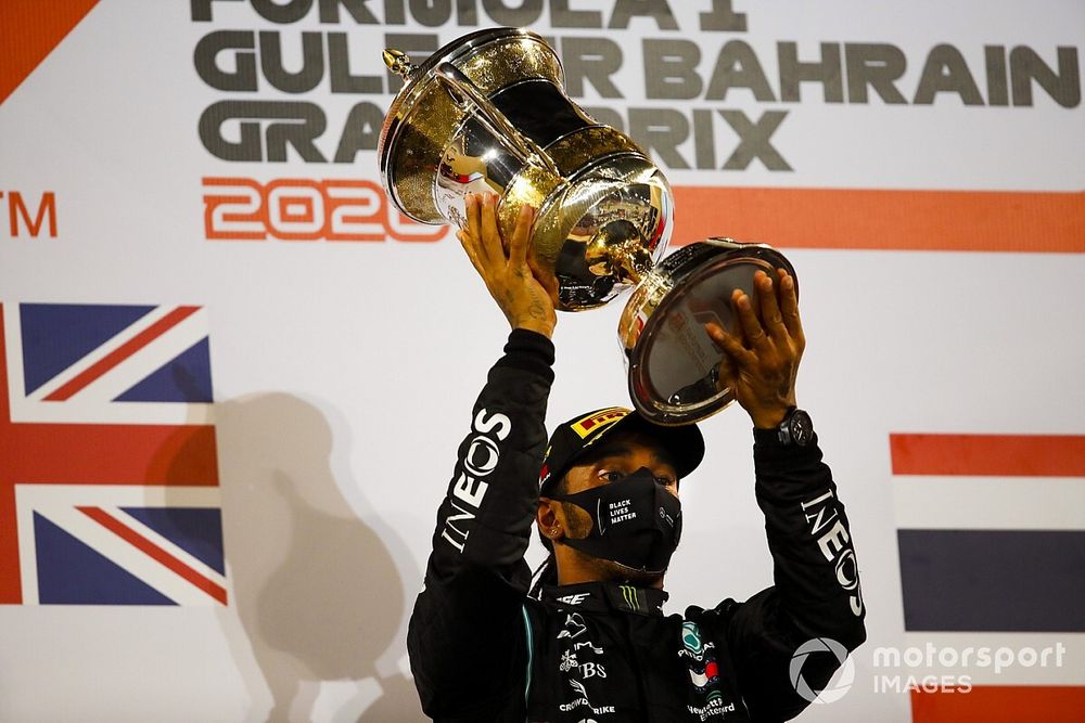 Lewis Hamilton, Mercedes-AMG F1, 1st position, lifts his trophy on the podium