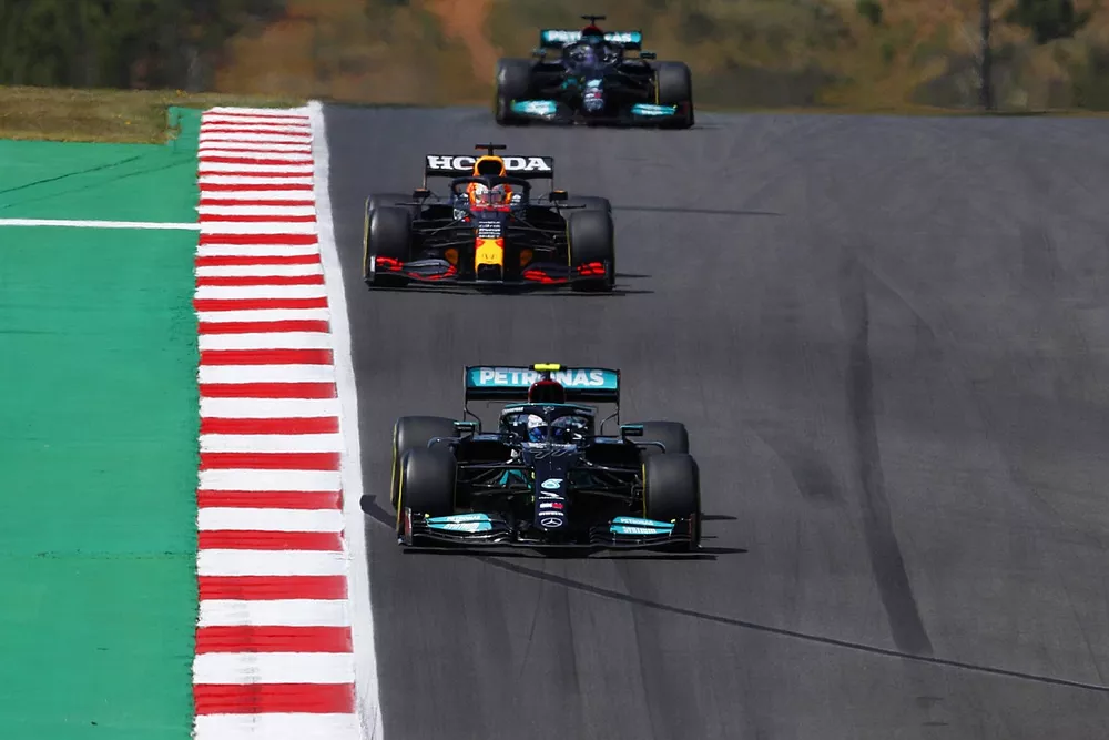Valtteri Bottas, Mercedes W12, Max Verstappen, Red Bull Racing RB16B, and Lewis Hamilton, Mercedes W12
