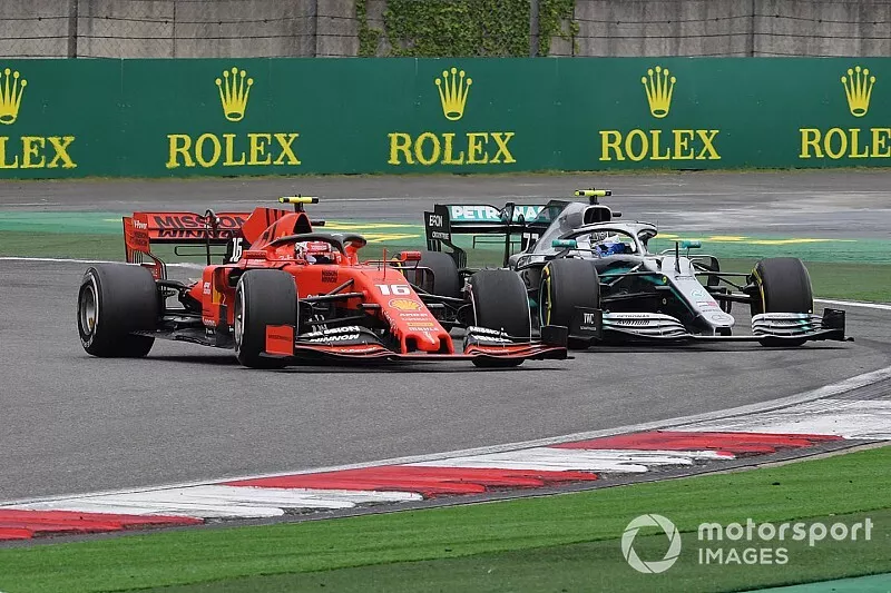 Charles Leclerc, Ferrari SF90, battles with Valtteri Bottas, Mercedes AMG W10