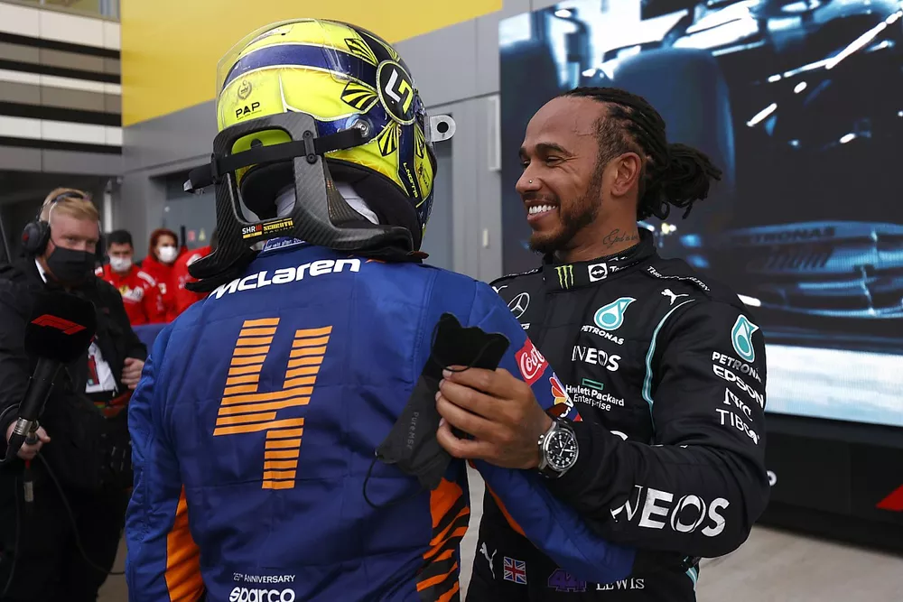 Lando Norris, McLaren, congratulates Lewis Hamilton, Mercedes, 1st position, after the race