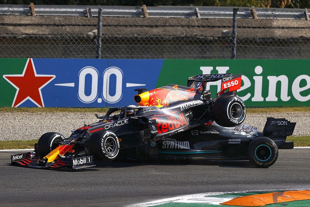 Lewis Hamilton, Mercedes W12 and Max Verstappen, Red Bull Racing RB16B, crash out
