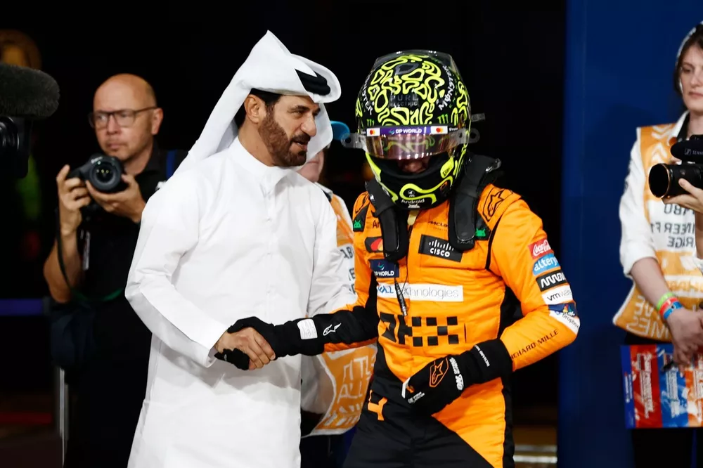 Mohammed Ben Sulayem, President, FIA, congratulates pole man Lando Norris, McLaren F1 Team, in Parc Ferme