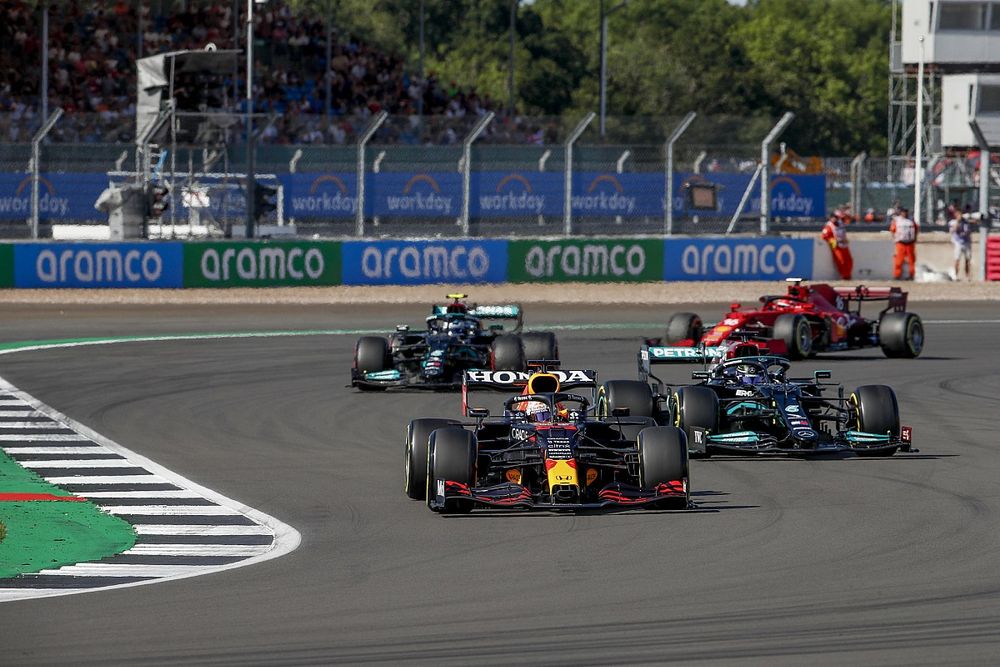 Max Verstappen, Red Bull Racing RB16B, Lewis Hamilton, Mercedes W12, Valtteri Bottas, Mercedes W12, and Charles Leclerc, Ferrari SF21