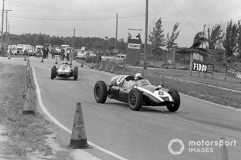 Jack Brabham, Cooper T51 Climax, leads Bruce McLaren, Cooper T51 Climax